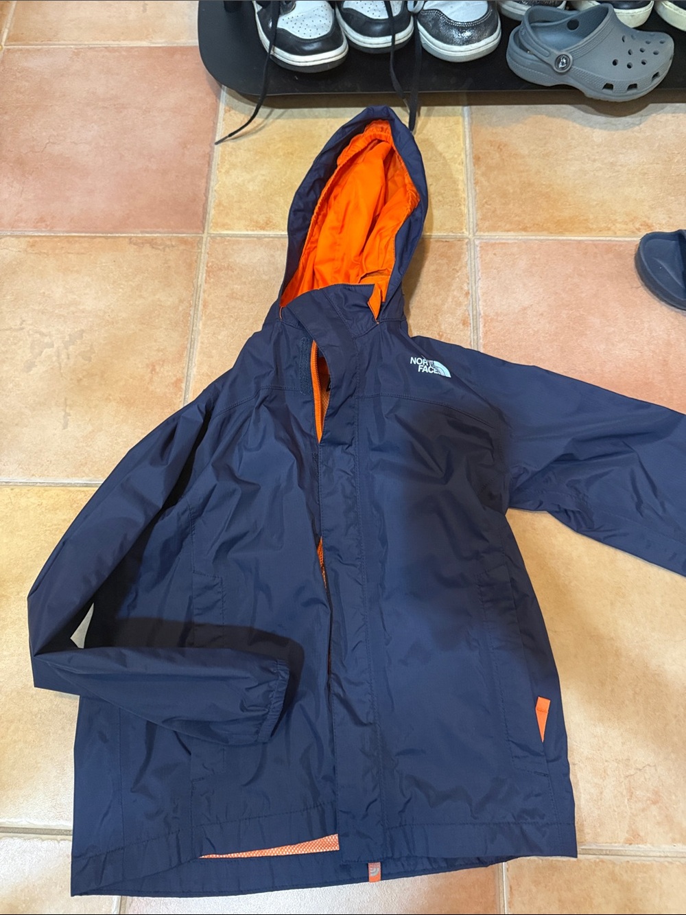 The North Face Navy Blue Jacket with Orange Lining size small 7/8